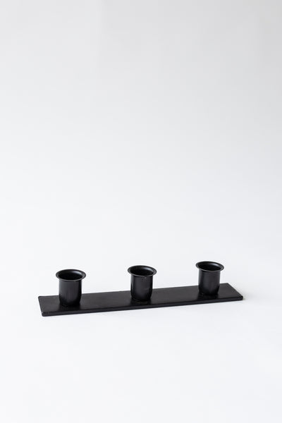 The Triple Candlestick Holder