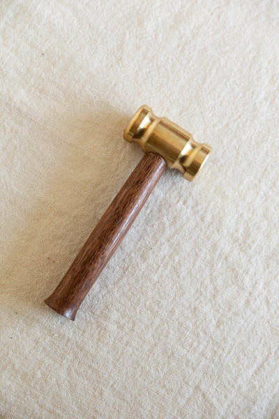 The Solid Brass Hammer