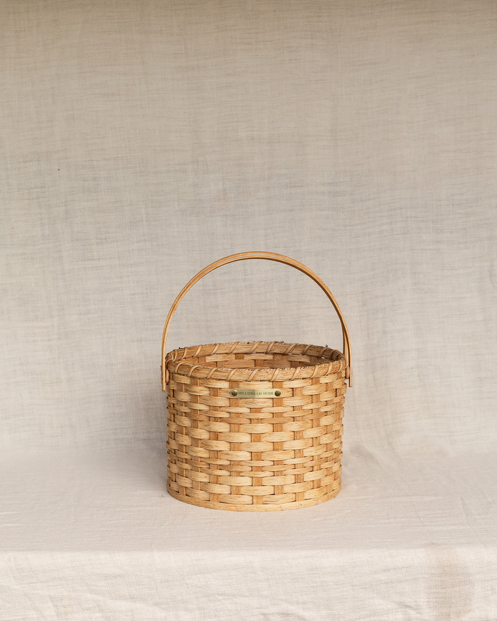 The Round Carrying Basket with Wooden Handles