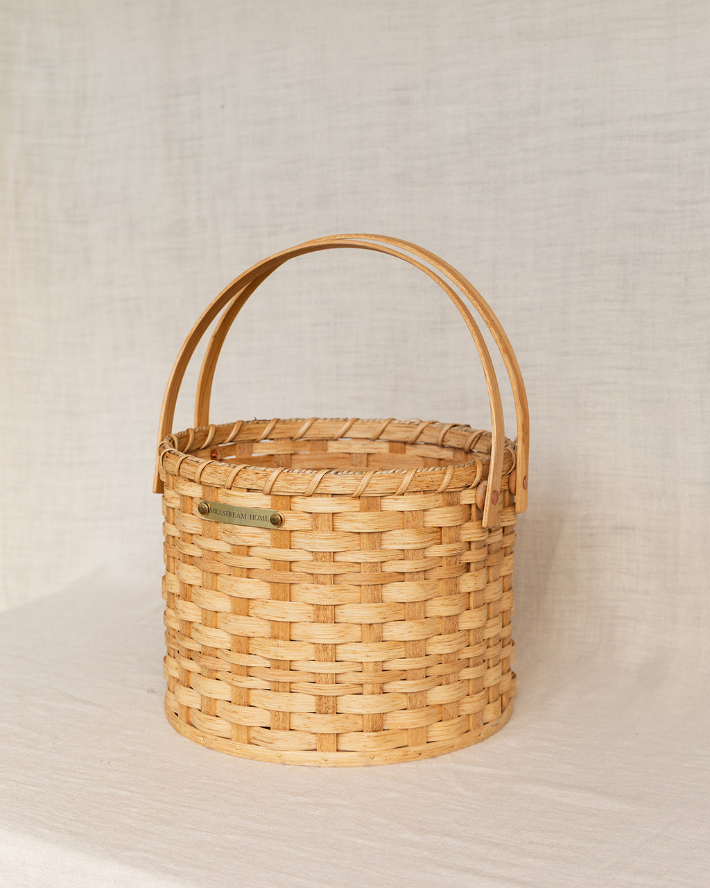 The Round Carrying Basket with Wooden Handles