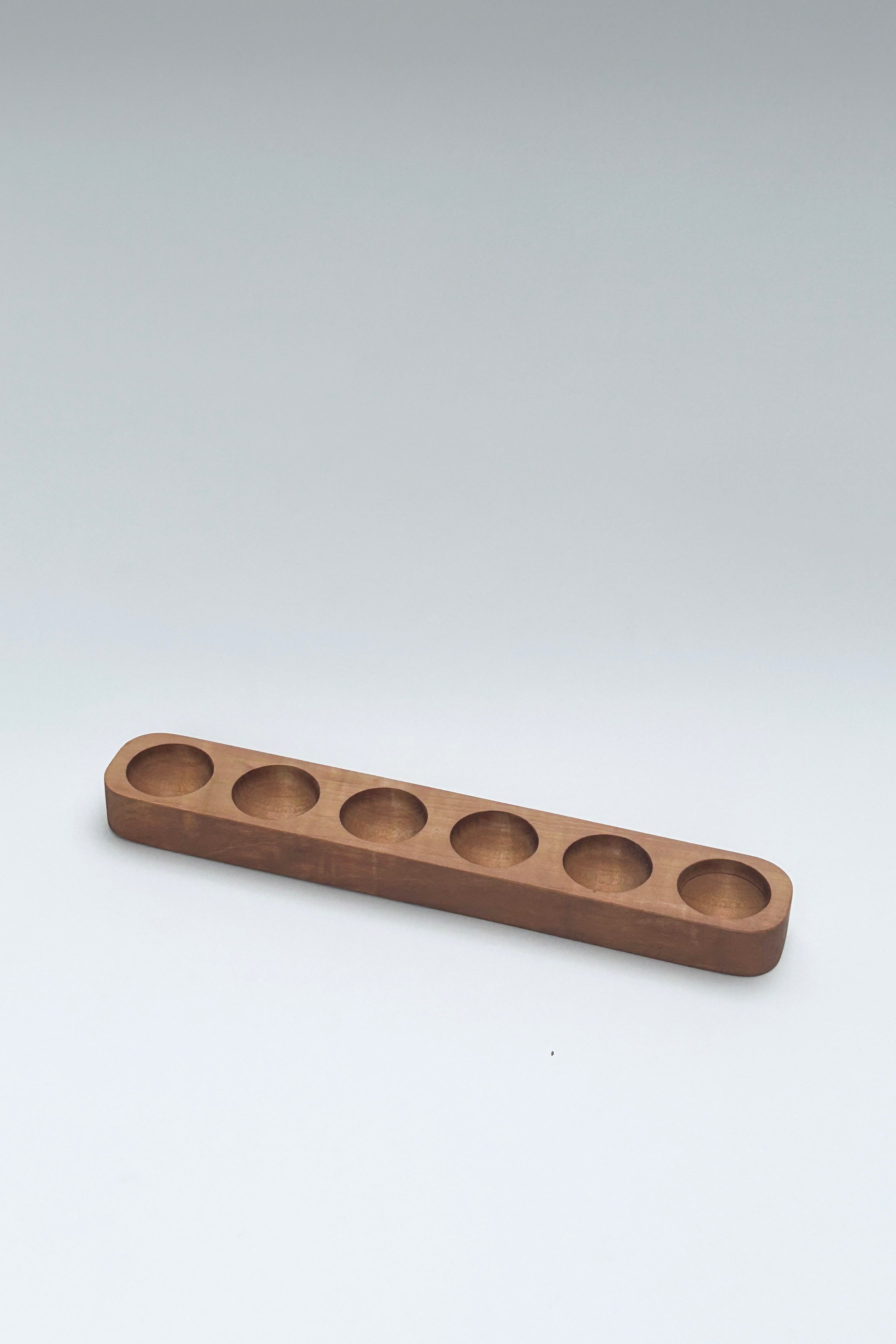The Wooden Egg Holder