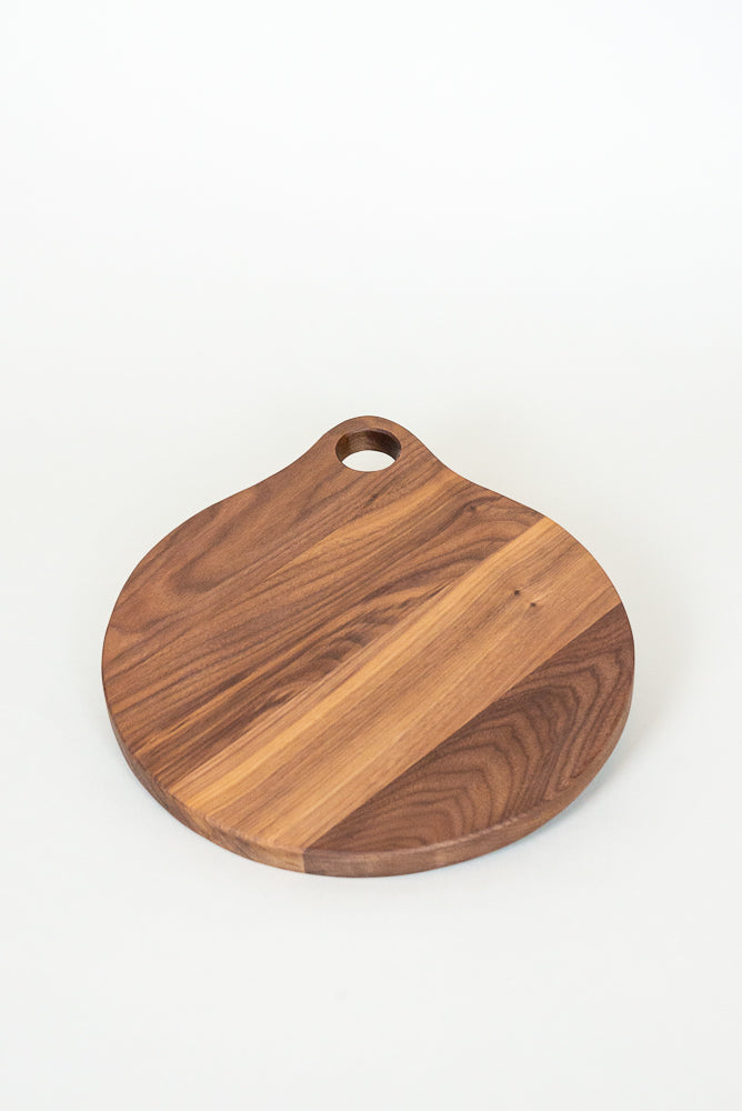 The Handcrafted Round Cutting Board in Walnut
