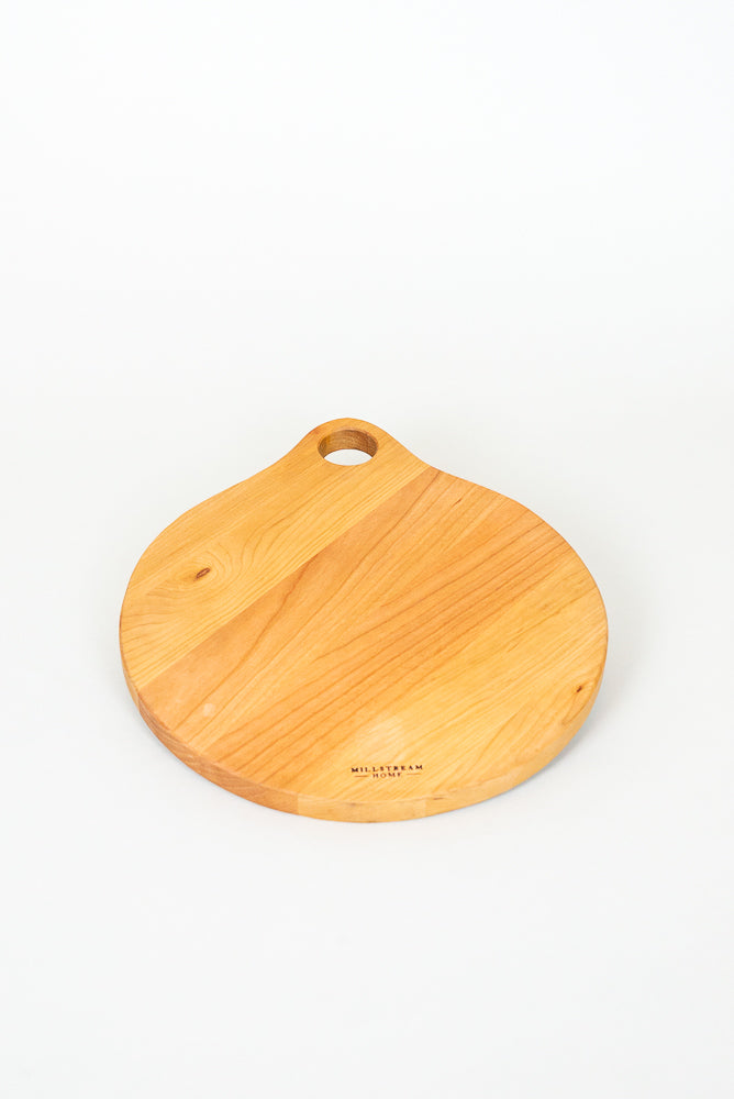 The Cherry Handcrafted Round Cutting Board