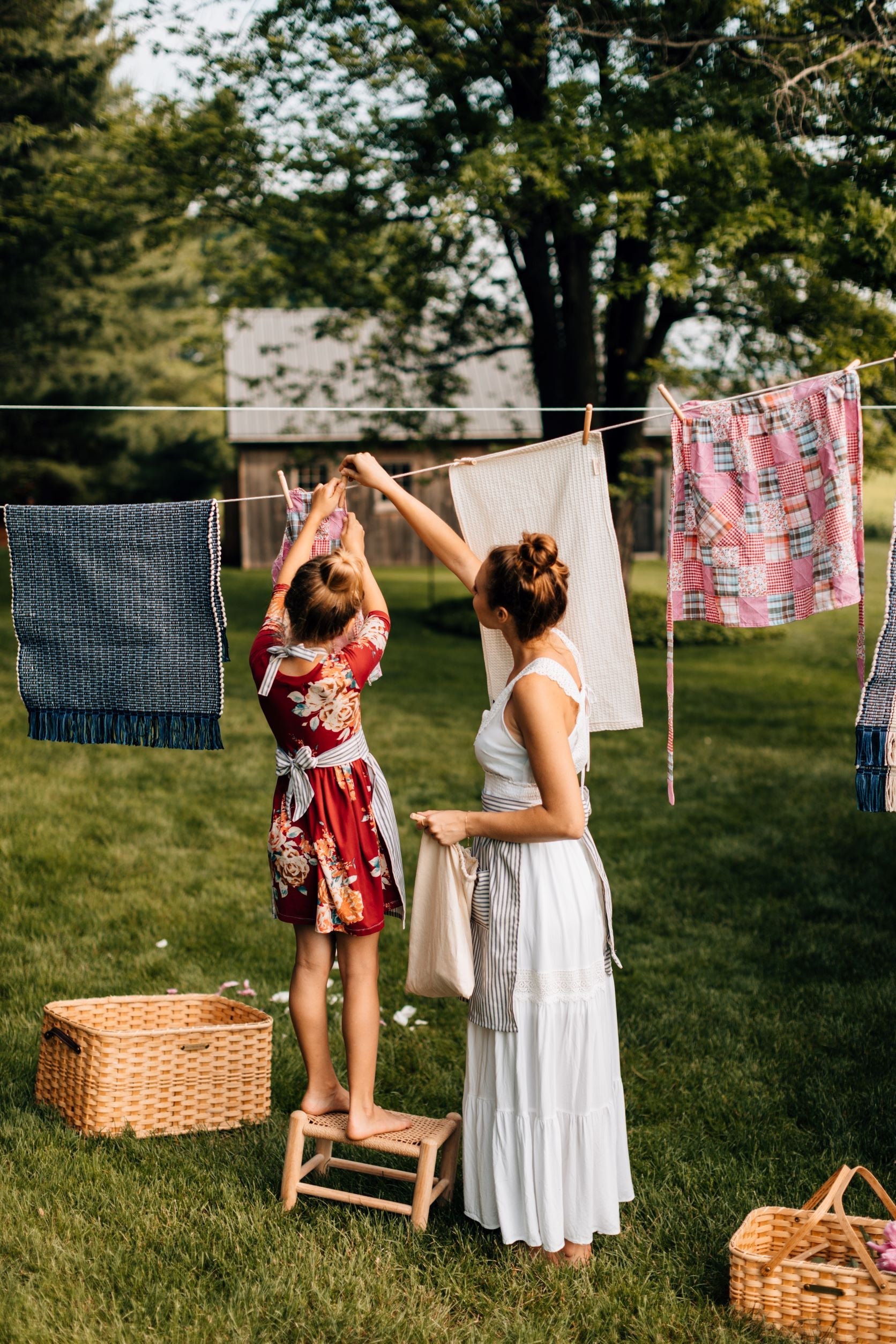 The Adult Quilted Patchwork Apron Hanging on a Clothesline