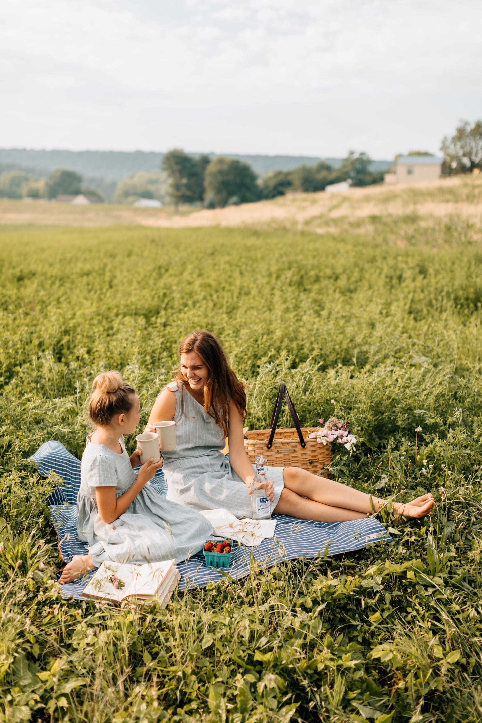 Two People using Millstream Home Cups