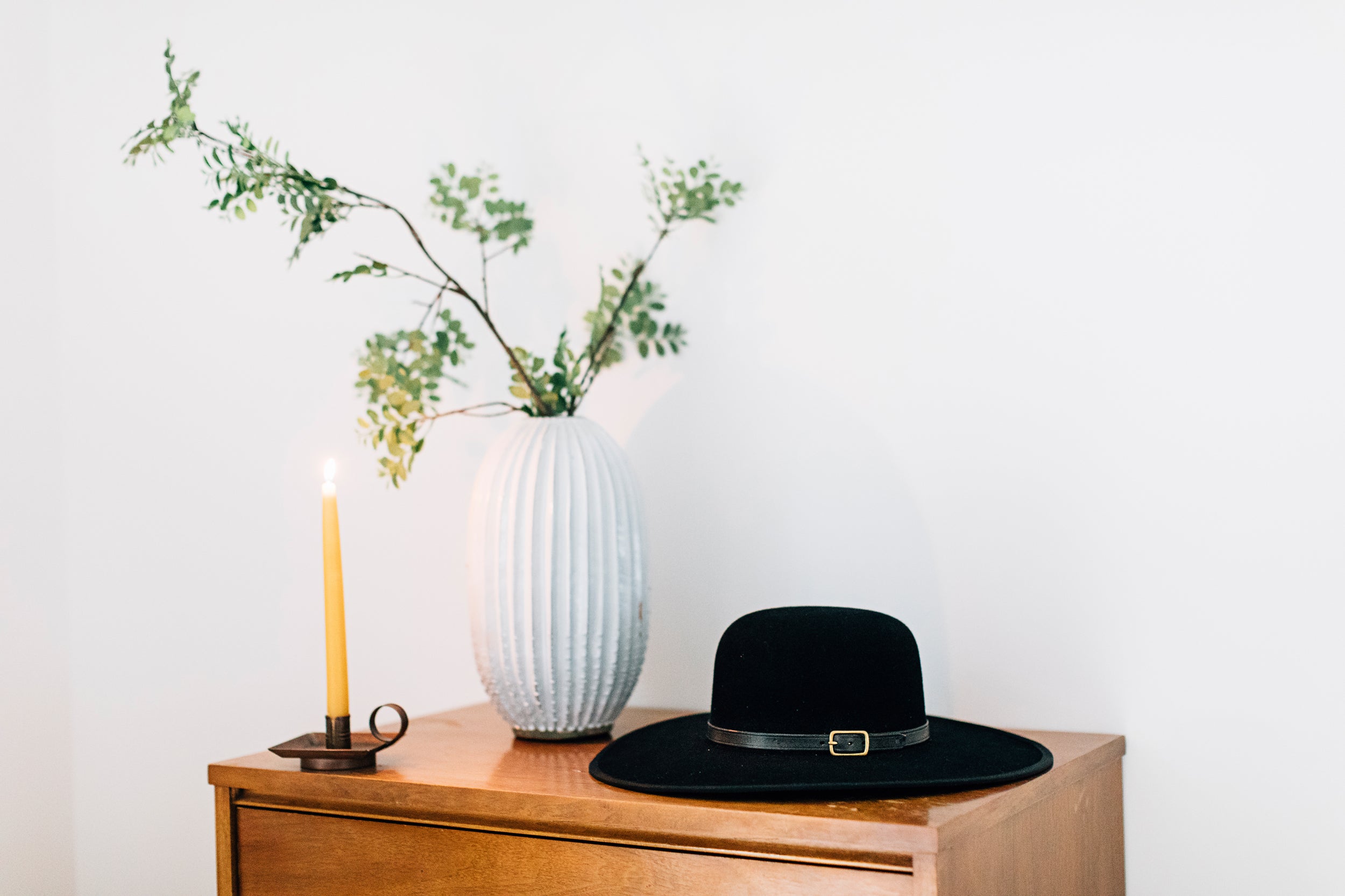 The Copper Candleholder on a Dresser