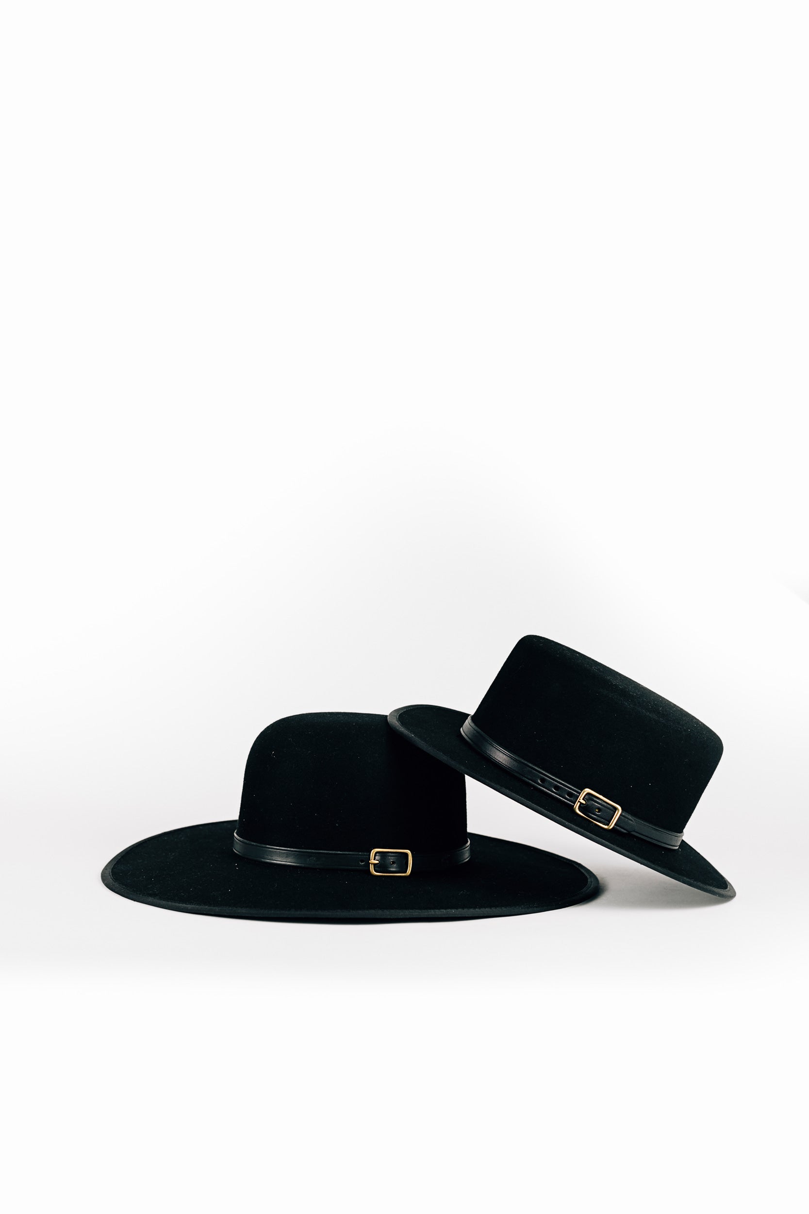 Two Child's Black Saddle Hats